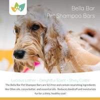 A wet dog being bathed, covered in lathered shampoo, with the Bella Bar Pet Shampoo Bars branding displayed in white text above.