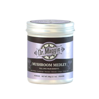 Dr. Maggie Mushroom Medley jar with a purple and black label shown upright on a white background. Text on the label highlights 'Full Spectrum Benefits' and lists six mushrooms.