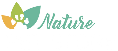 Nature Pet Store logo featuring three overlapping leaf shapes—green, teal, and orange—with a paw print cutout inside the orange leaf and the words “Nature Pet Store” in script and bold lettering.