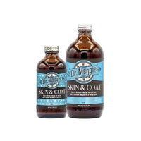 Two amber bottles of Dr. Maggie Skin & Coat, one 240 mL and one 480 mL, displayed side by side against a white background.